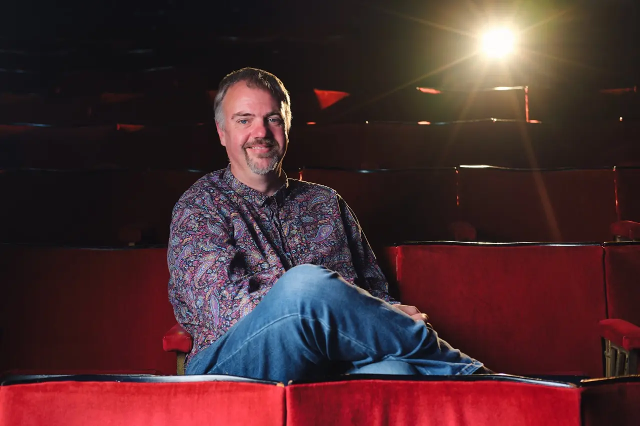 Des Reynolds seated in the auditorium at The Seagull theatre